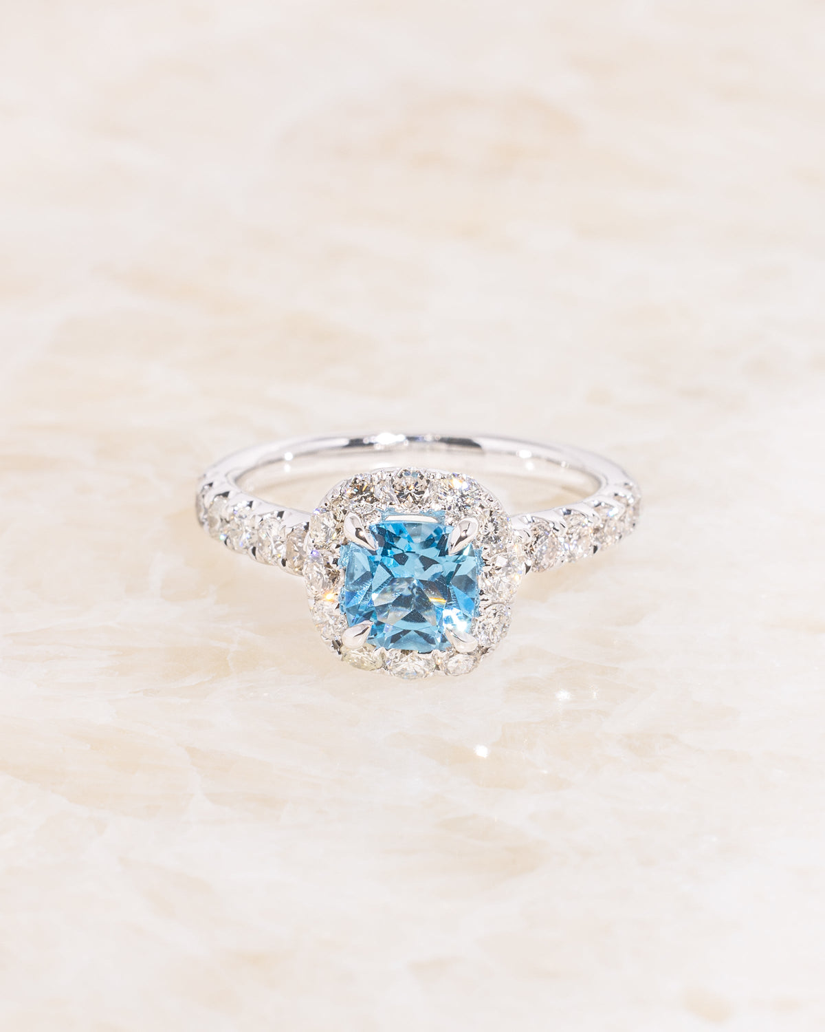 https://www.shopprincessbridediamonds.shop/wp-content/uploads/1696/11/1-14ct-cushion-blue-topaz-engagement-ring-princess-bride-diamonds_0.jpg