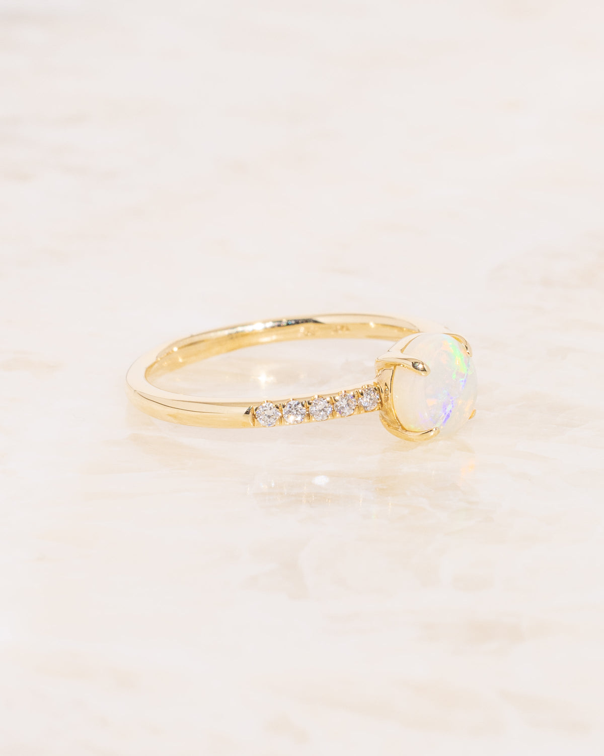 https://www.shopprincessbridediamonds.shop/wp-content/uploads/1696/12/round-ethiopian-jelly-opal-ring-princess-bride-diamonds_1.jpg